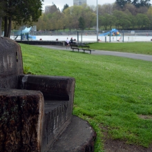 A huge old stump cut out to make a chair in Stanley Park